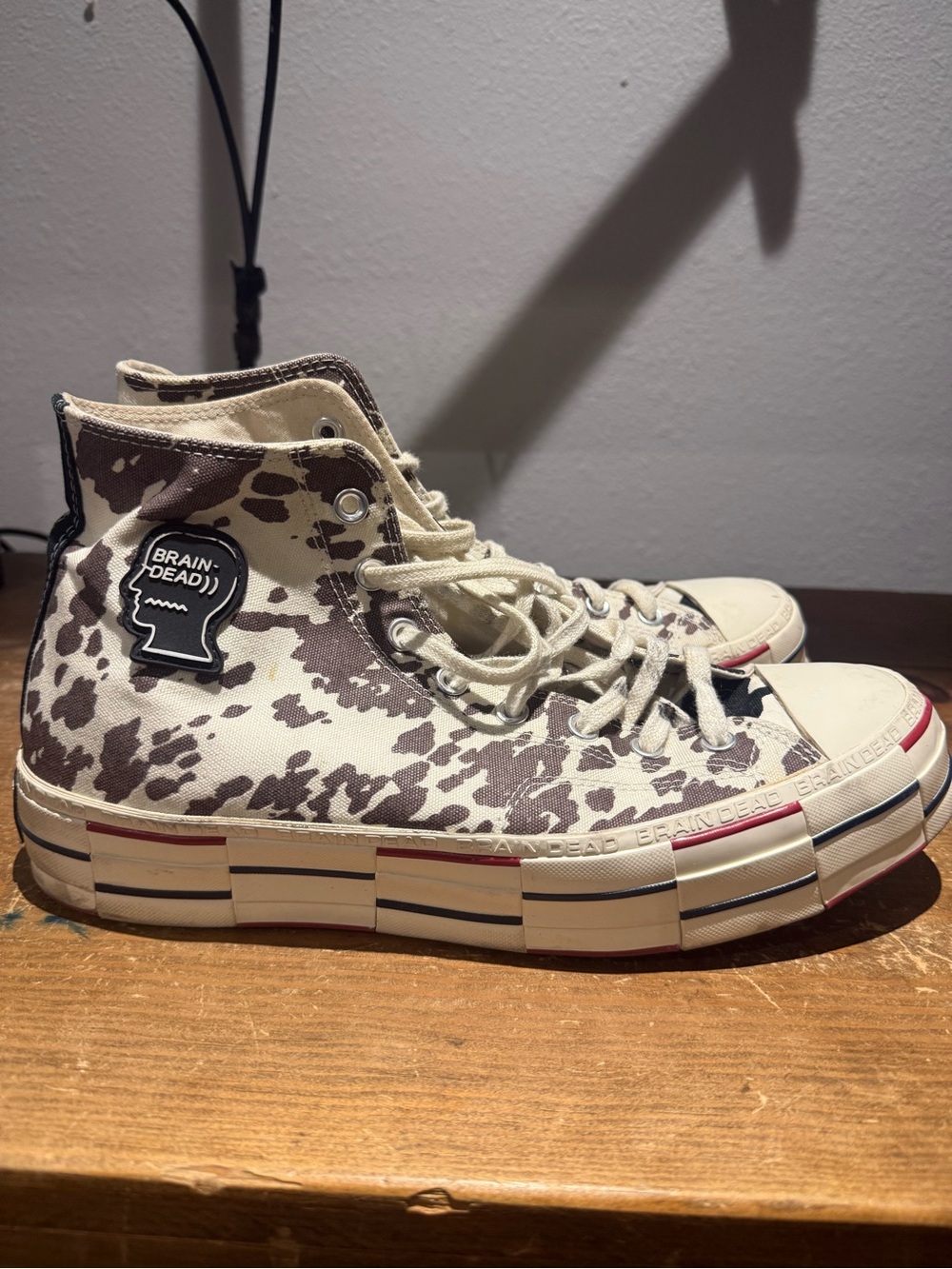 Converse High-Top Sneakers in Cream and Brown Cow Print